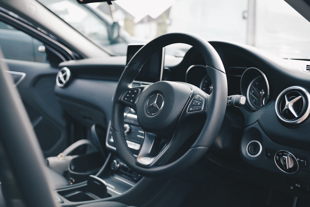 MOSCOW, RUSSIA - FEBRUARY 02, 2022. Mercedes-Benz Logo On The Mercedes-Benz  C-Class 200 Steering Wheel. Steering Wheel Close Up View. Stock Photo,  Picture and Royalty Free Image. Image 196716867.