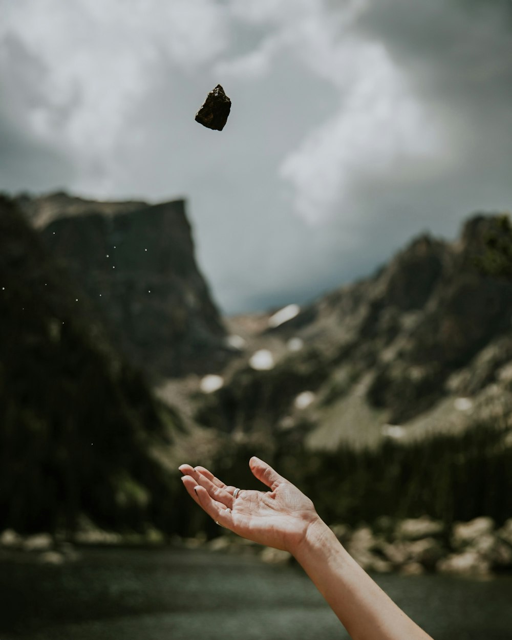 person threw stone during daytime