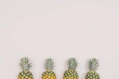 four pineapples on white background summer zoom background