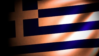 Visual graphic illustrating collaboration between Greece, Türkiye, and Hungary with flags and handshake icons.