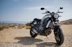 black cruiser motorcycle on soil