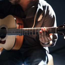 person playing guitar