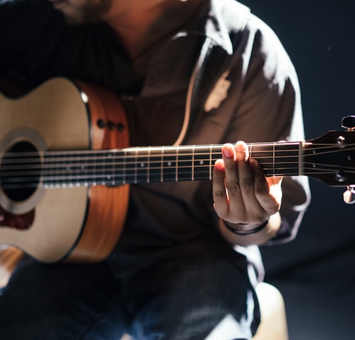 person playing guitar