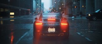 gray Porsche car on road with maximum traction on performance tyres