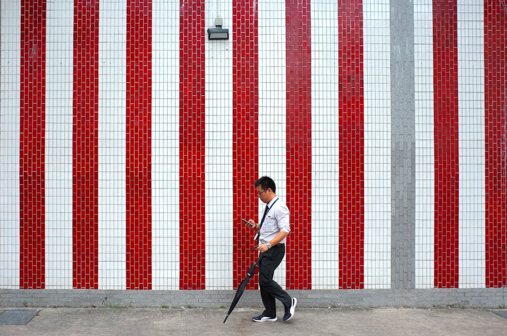 man standing near wall