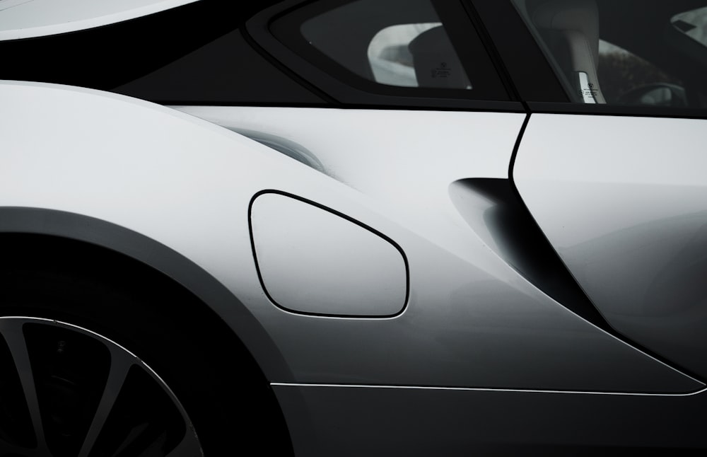 a close up of the side of a sports car