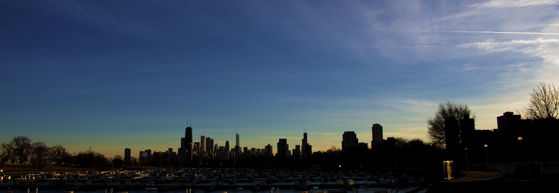 A panoramic view of a city skyline at dusk, symbolizing growth and opportunity in financial markets.