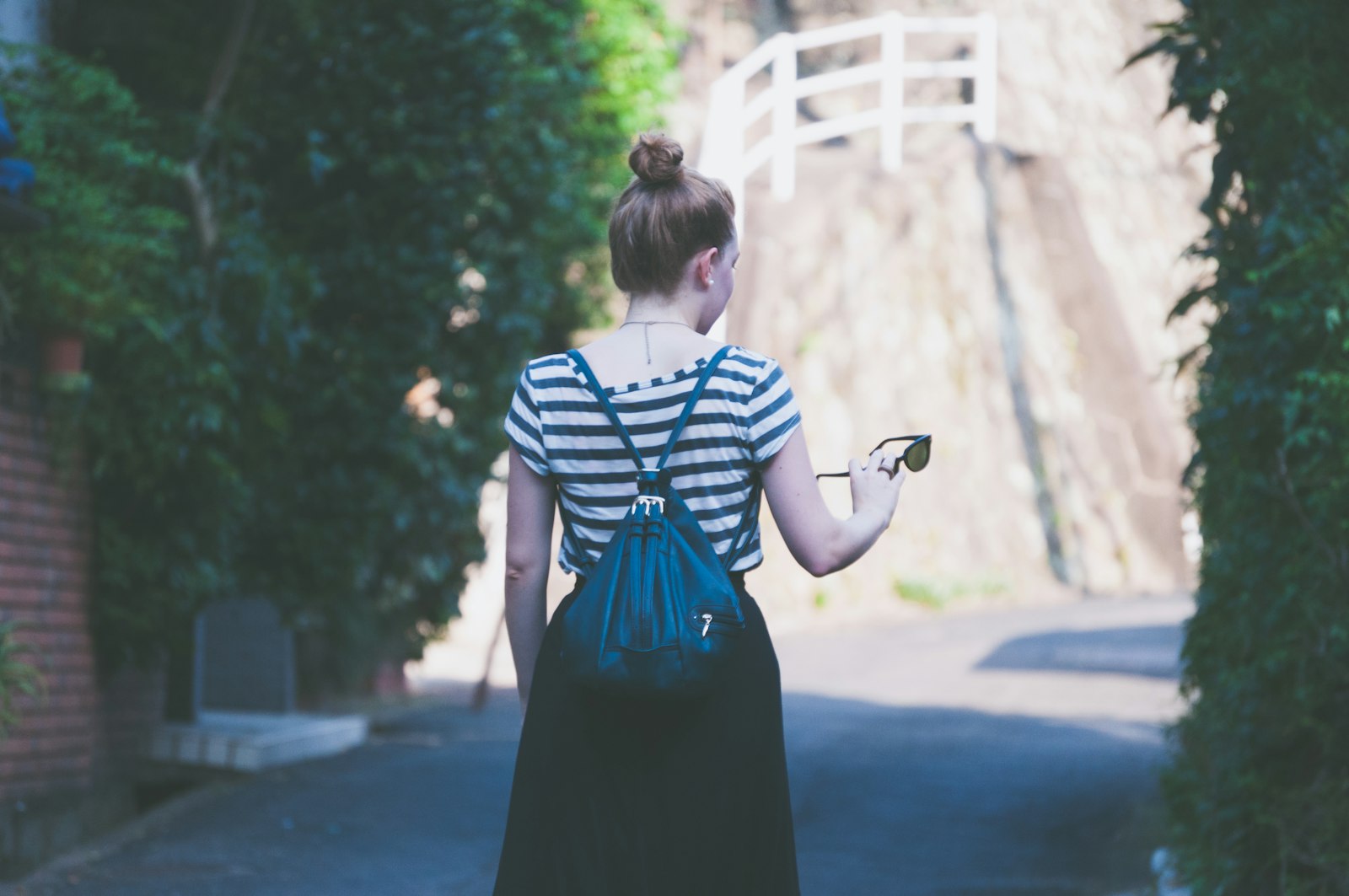 Nikon AF-S DX Nikkor 55-200mm F4-5.6G ED sample photo. Woman in striped shirt photography