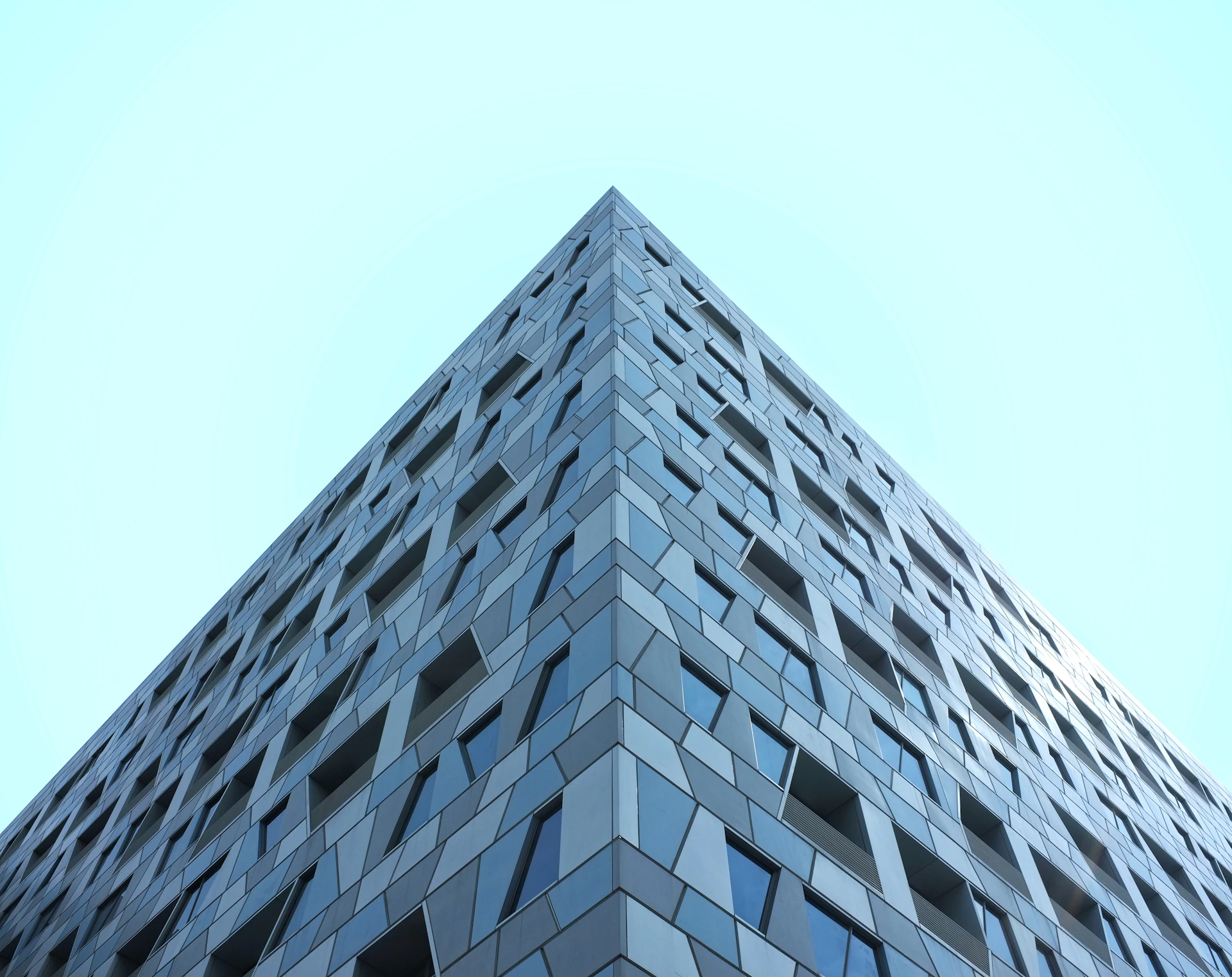 gray concrete building under blue sky