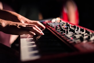selective focus photo of person playing electric guitar