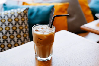 caramel iced coffee on table