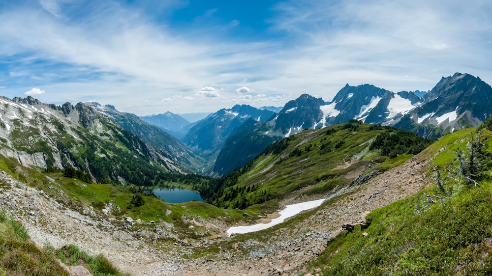 mountain near body of water during daytime