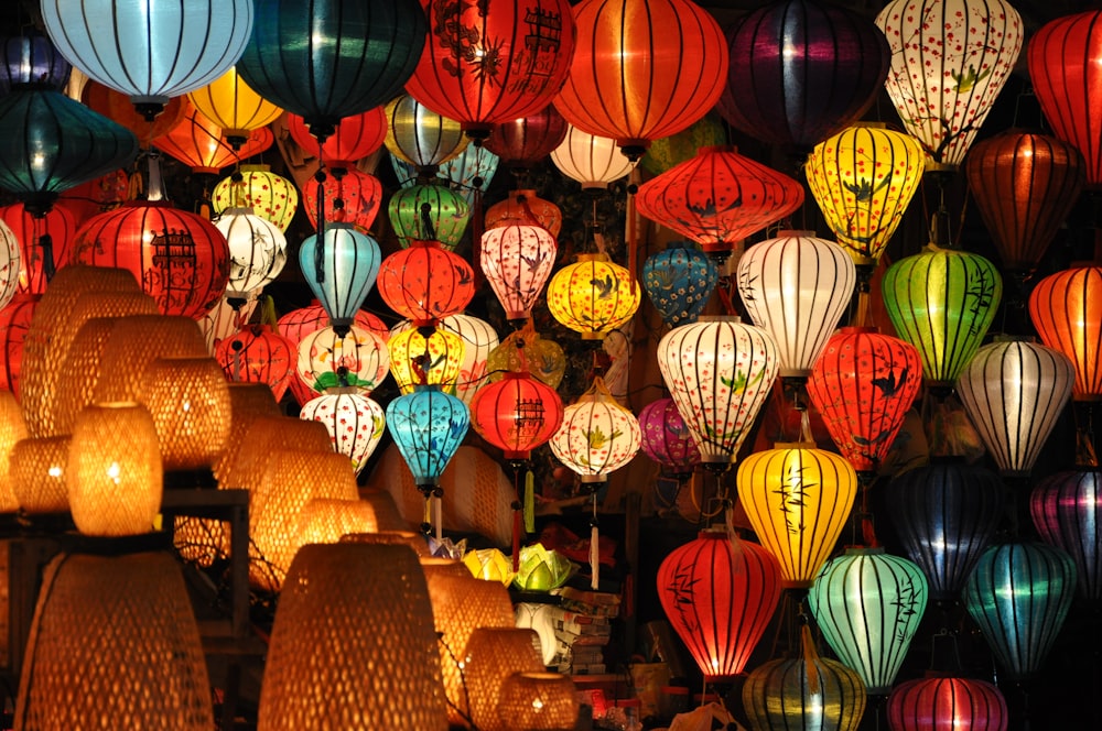 woman in yellow and black floral dress holding brown umbrella photo – Free  Candle Image on Unsplash