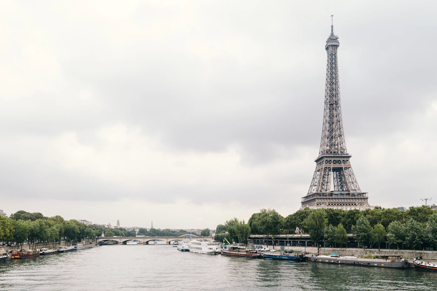 The Eiffel Tower rising above Paris rooftops