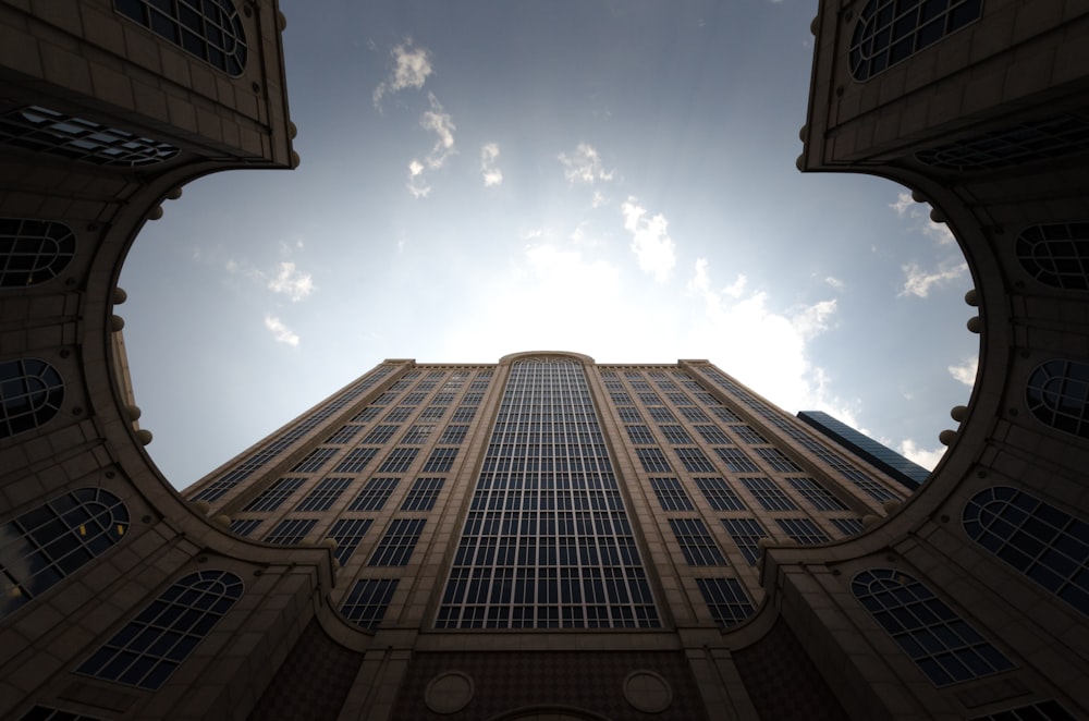 low angle photo of brown concrete building