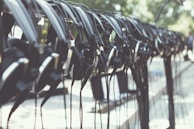 An array of noise-canceling headphones arranged neatly on a shelf.