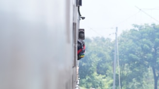 Sony headphones being used by a traveler on a train.