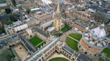 A panoramic view of the university campus with historic and modern buildings