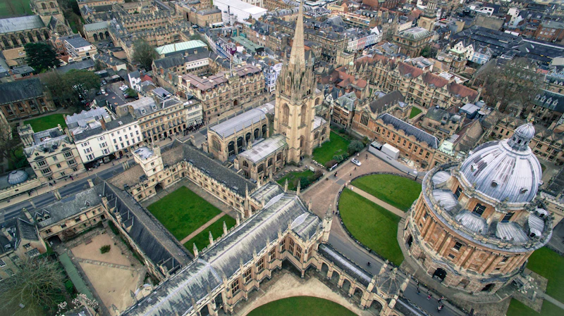 Aerial view of the domes and stone quads of the University of Oxford