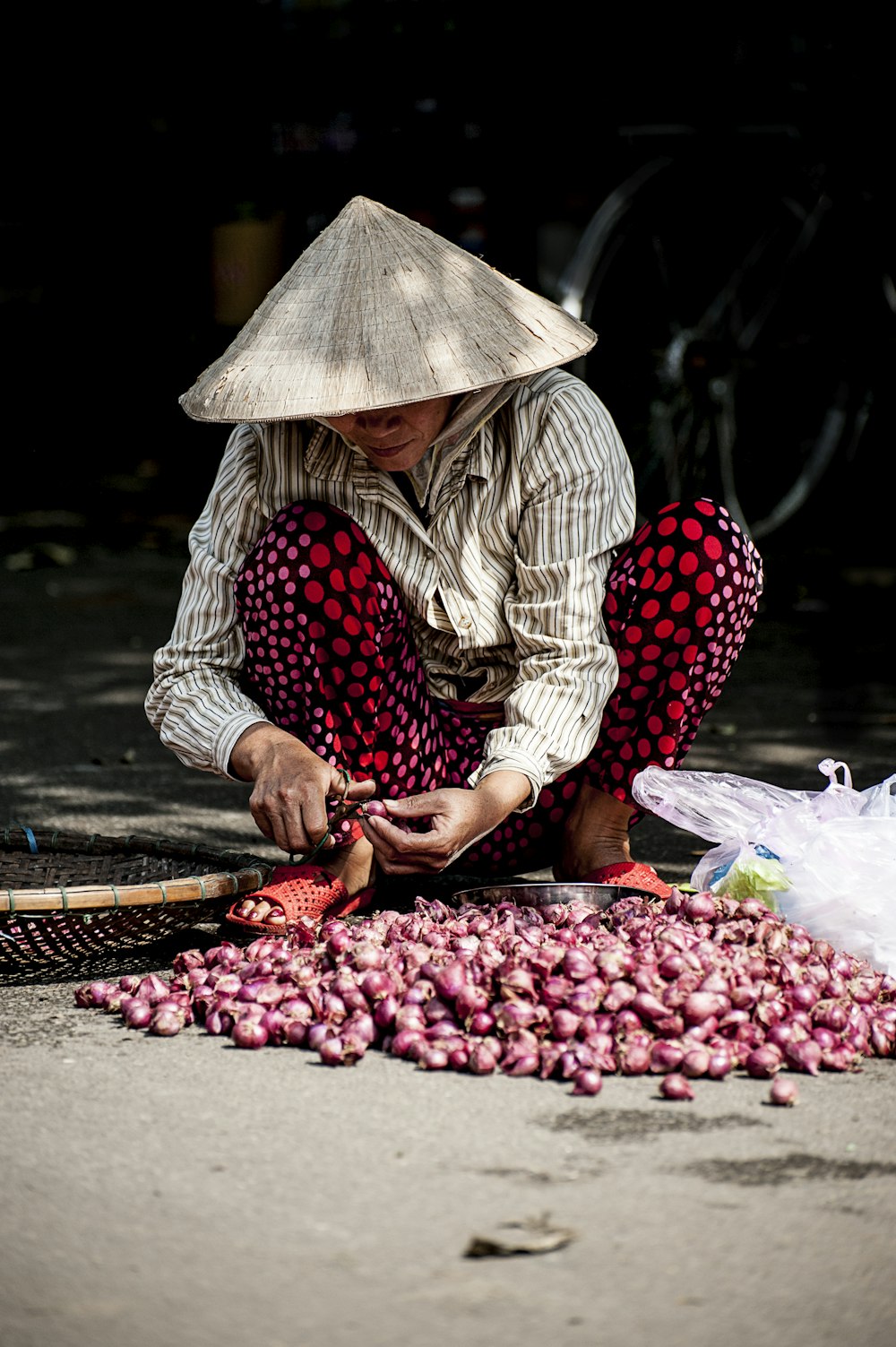 person slicing onions