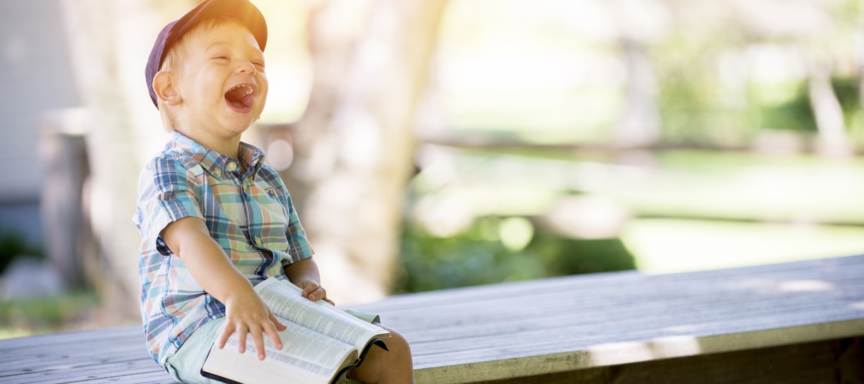 boy enjoying reading