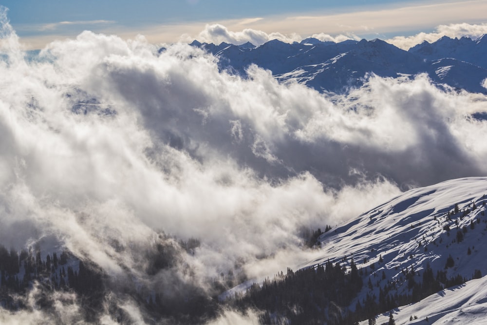 white clouds over mountain