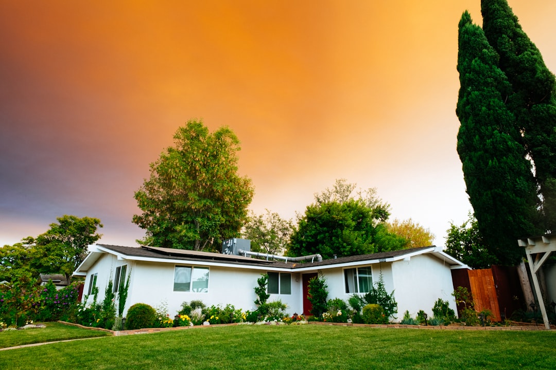 landscape photography of bungalow house, Cozy white house