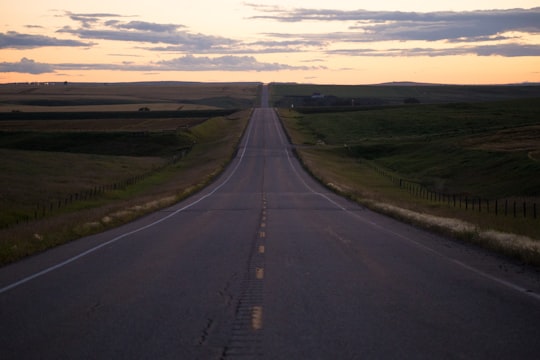 empty concrete road in Three Hills Canada