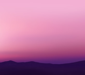 A serene landscape featuring soft purple hues and minimalistic design.