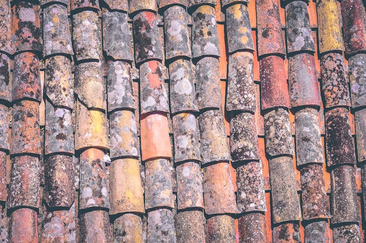 Brown roof shingles texture close-up