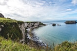 cliff near sea at daytime