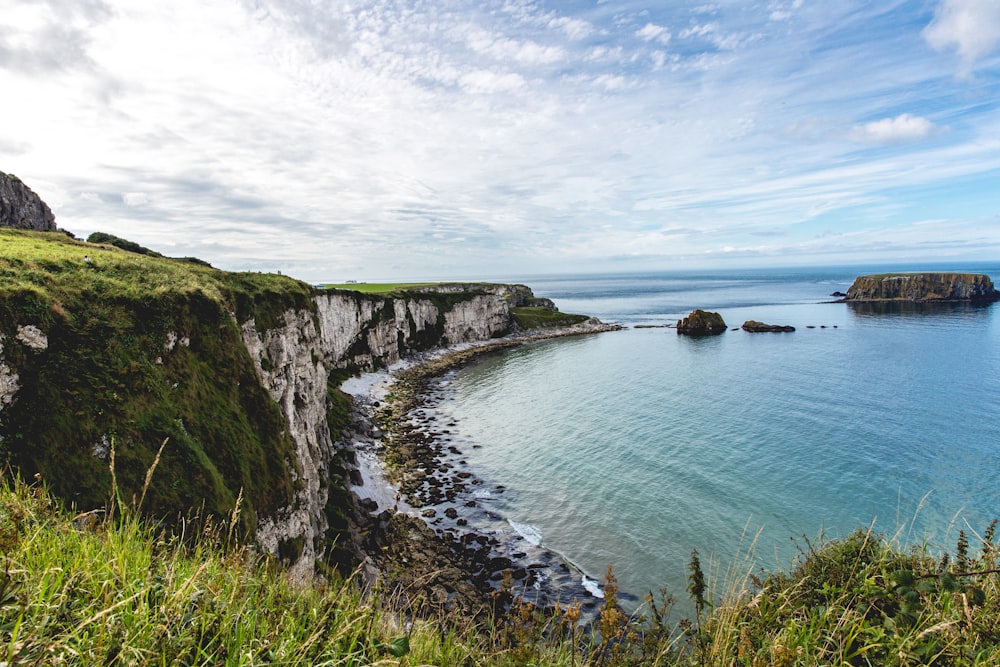 cliff near sea at daytime