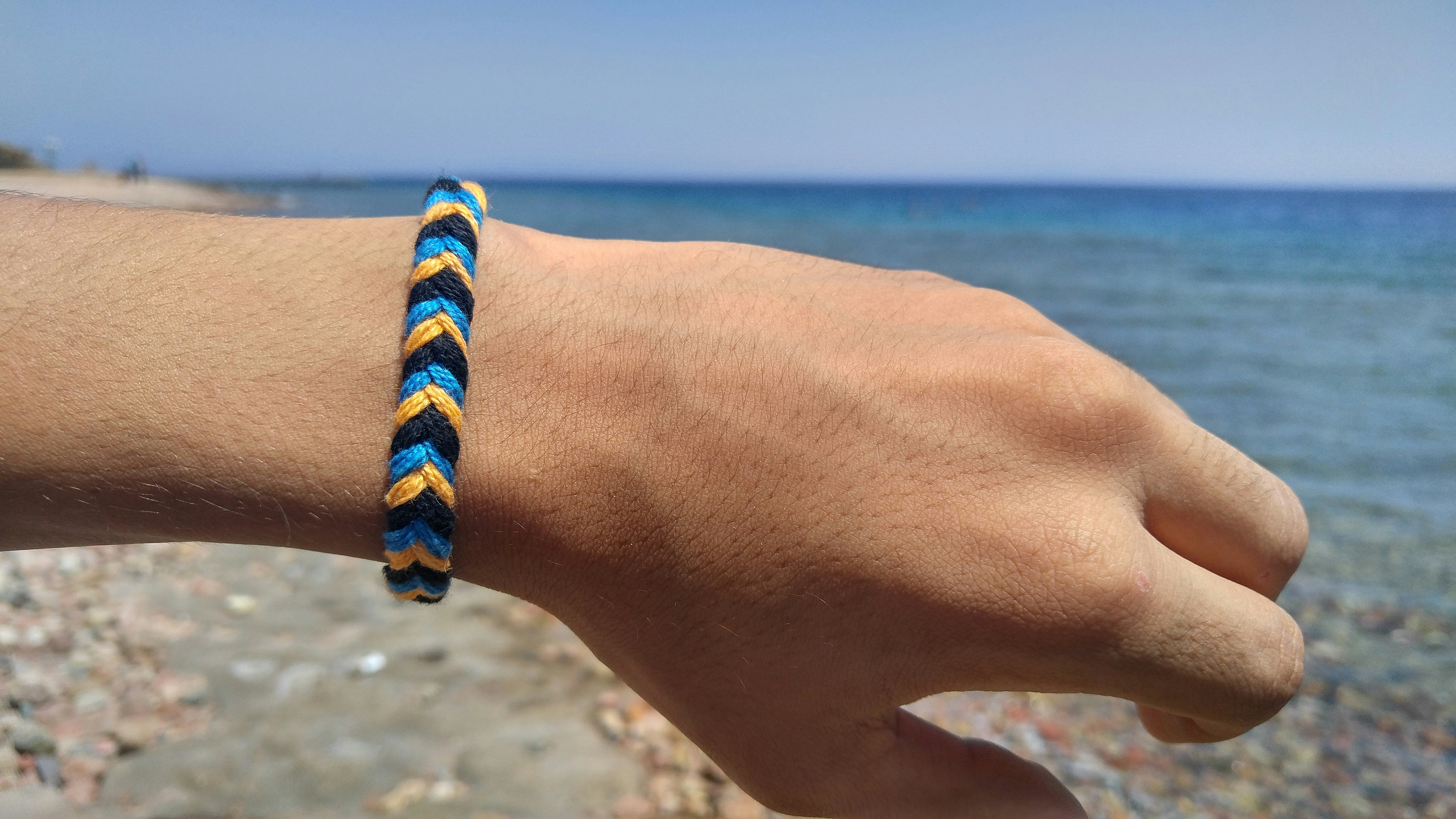 Poncho met golfpatroon