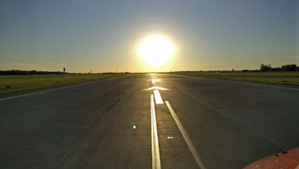 A freshly restored runway glistening under bright morning light, ready for takeoff.