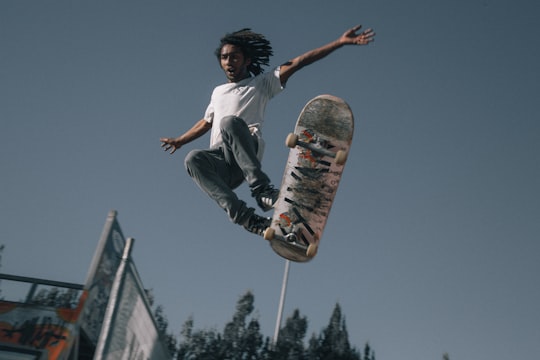 man wearing white T-shirt using skateboard in Toowoomba Australia