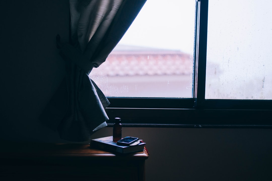 rainy window and table book