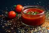 tomato and tomato puree with parsley in bowl