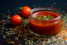 tomato and tomato puree with parsley in bowl