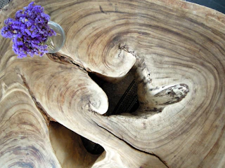A finished product displayed elegantly on a wooden table with natural light.