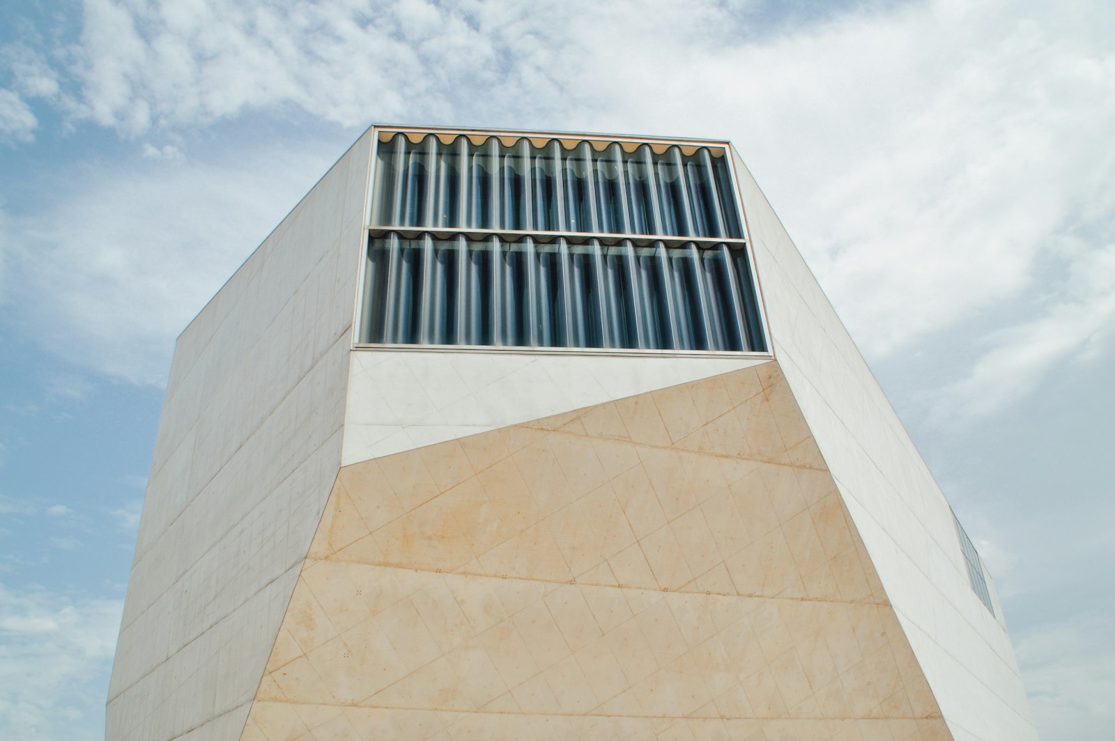 Tamron AF 18-200mm F3.5-6.3 XR Di II LD Aspherical (IF) Macro sample photo. White concrete tall building photography