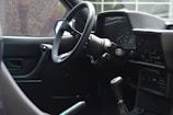 A close-up of a car's dashboard and controls.