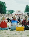 group of people on grass field under sunny day