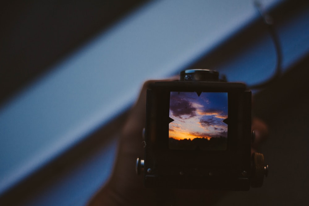 person holding camera