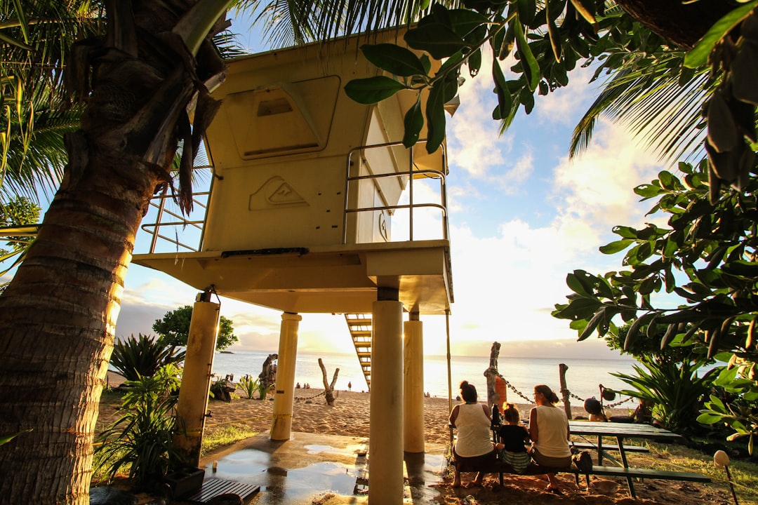 People at a Hawaii beachfront location.