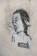 A black and white street art illustration featuring a child-like face with an open mouth, as if shouting. The word 'money' is written in a speech bubble. Below the face, the word 'wisdom' is printed in a blocky font. The image is pasted on a textured, worn wall.