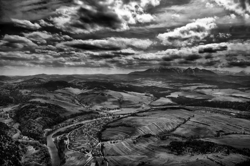 gray scale photography of road and mountain