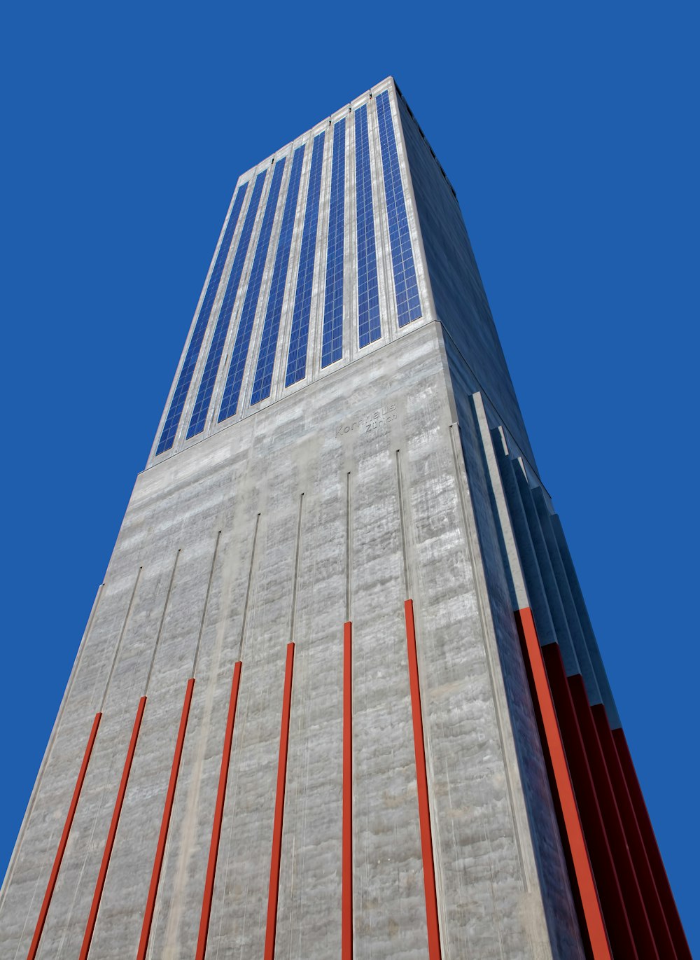 a very tall building with a sky background