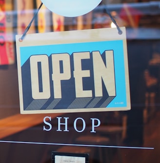 gray and blue Open signage