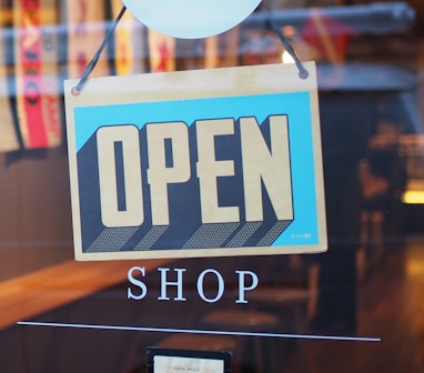 gray and blue Open signage