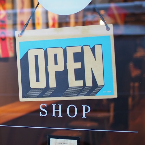 gray and blue Open signage